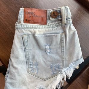 Size 24 one teaspoon shorts. Light wash